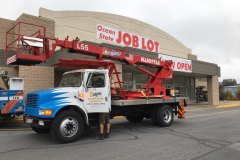 Custom banners in Coopersburg, being installed by D-Signs & Awnings