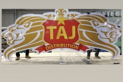Business sign for TAJ