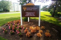 Post sign for Centennial School