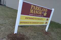 Close up of Parkland Manor post sign