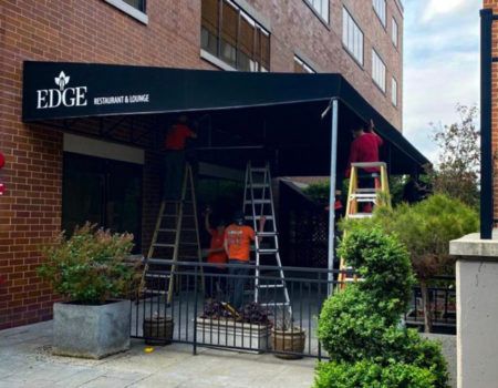 technicians working on installing Stationary Awnings & Canopies